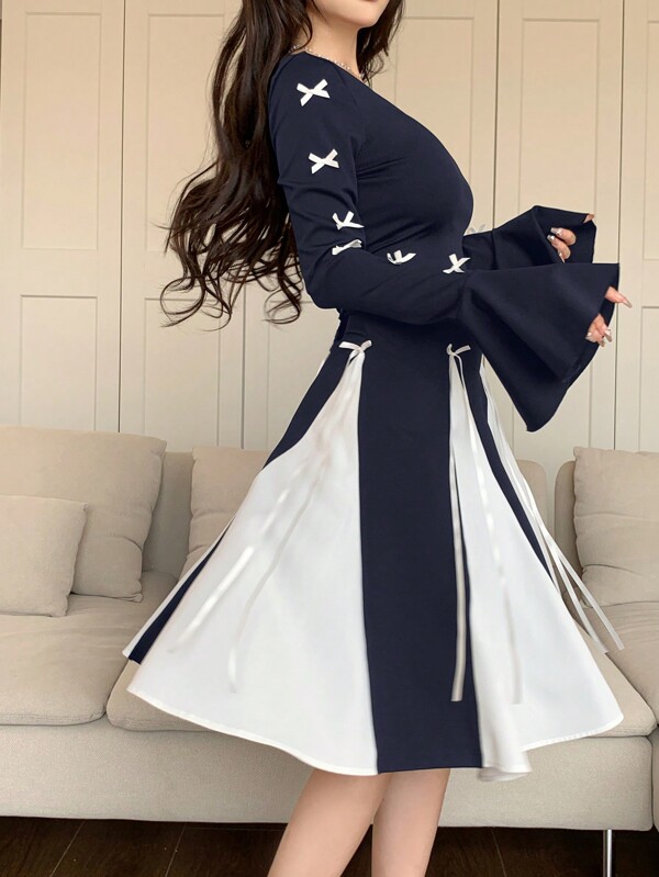 Modelyn فستان نسائي أنيق بأكمام طويلة بياقة مستديرة، مزين بفيونكة وتصميم ألوان متباينة
