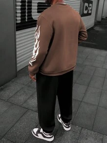 Manfinity LEGND Set de 2 piezas Talla grande Hombre Top de manga larga con cuello redondo con estampado de letras y Pantalones con cordón