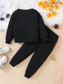 SHEIN 年轻女孩 2 件豹纹面板撞色亮片拼色宽松落肩运动衫和运动裤套装，适合圣诞节，非常适合秋冬季休闲和日常穿着以及日常上学。妈妈和女儿搭配。