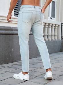 Manfinity Homme Jeans casuales de pierna recta y ajuste relajado para hombres con bolsillos