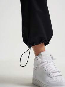 SHEIN Sports Quần thể thao cạp chun rút màu trơn cho nữ có túi ở eo và bo gấu ở mắt cá chân - màu đen - Xem 5