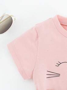 SHEIN 2pcs/Set Young Girl Round Neck Short Sleeve Printed Minimalist Top And A-Line Skirt