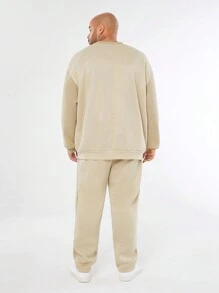 Manfinity NXTstreet Conjunto de sudadera de cuello redondo de manga larga de punto holgado y pantalón de chándal para hombre de talla grande