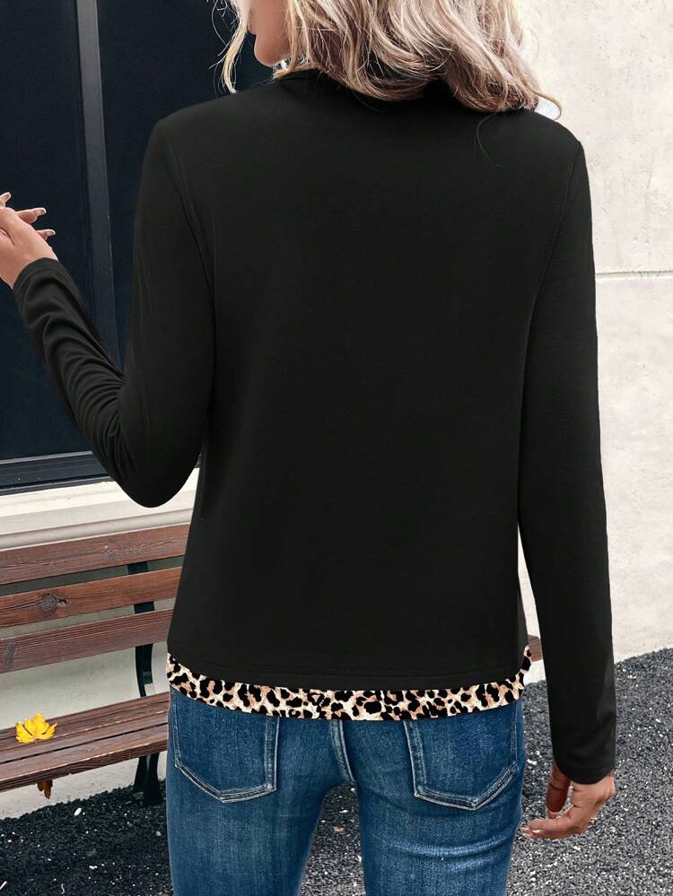 Felpa con cappuccio in sherpa nera da donna, stile athleisure, con chiusura lampo
