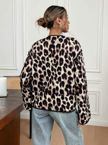 SHEIN Frenchy Abrigo acolchado casual de mujer con hombros caídos, manga larga, estampado de leopardo y nudo delantero, para invierno