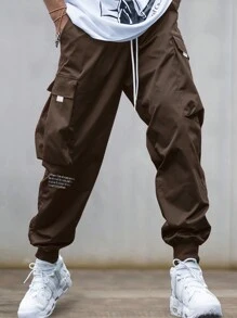 Manfinity EMRG Pantalones cargo para hombres con gráfico de lema, bolsillo con solapa y cintura con cordón