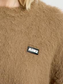 AiiRZ Pull tricoté doux et moelleux en mélange de laine, incontournable pour l'automne et l'hiver. Coupe ample et surdimensionnée. Badge logo sport décontracté pour le repos à la maison.