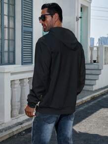 Manfinity Dauomo Sudadera casual con capucha y bolsillo con estampado de figura para hombres, manga larga