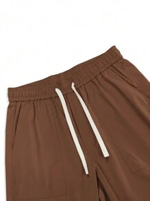 Chillumni Luźne męskie spodnie cargo z kieszeniami z patkami po bokach - Rdzawy brązowy - Zobacz 6