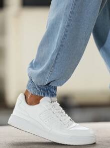 Manfinity Homme Jeans casuales y versátiles para hombres con cintura con cordón y pierna entallada con bolsillos