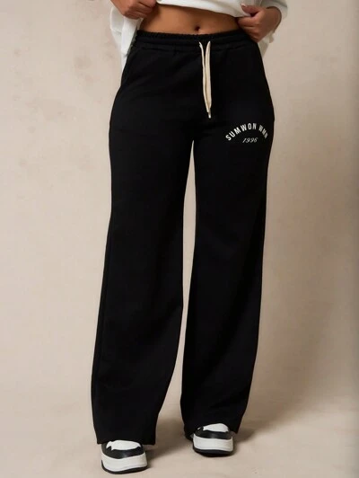 SUMWON WOMEN Sumwon Win Calça de Moletom Retro Esportiva de Pernas Largas, Calça de Lazer para Exercícios, Calça Casual de Moletom com Cordão, Cintura Elástica e Bolsos Laterais, Coleção Athleisure 1996