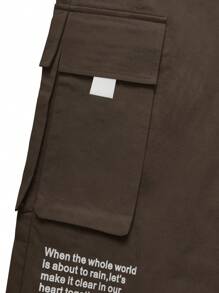 Manfinity EMRG Pantalones cargo para hombres con gráfico de lema, bolsillo con solapa y cintura con cordón