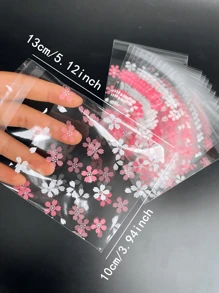 Set de 100 bolsas de regalo con estampado de flores de dibujos animados, bolsas de plástico con diseños de dibujos animados para fiestas, vuelta al colegio, San Valentín, bodas, cumpleaños - Multicolor - Ver 4