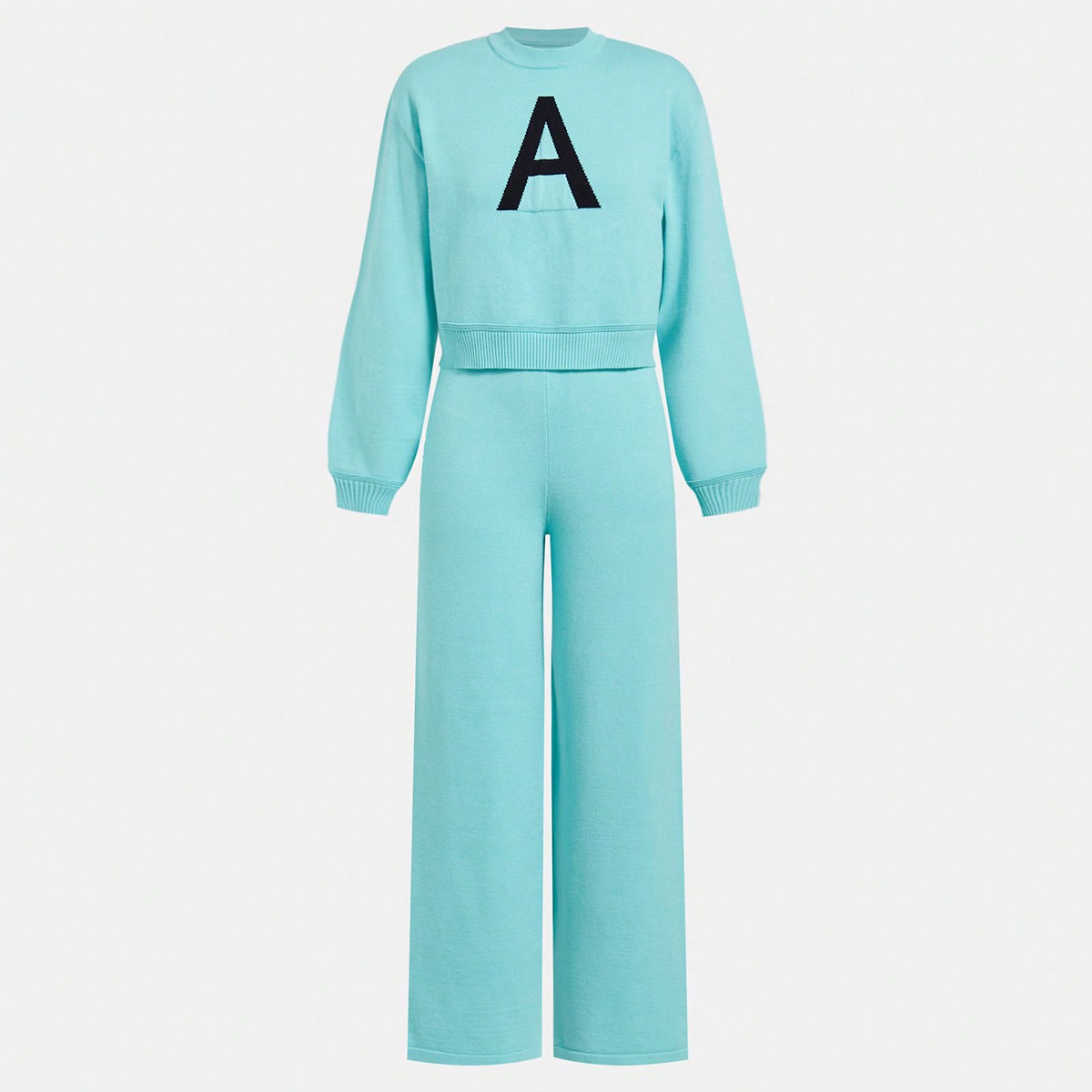 Conjunto de suéter de punto con textura y estampado de letras de estilo callejero personalizado, y pantalones rectos, ideal para mantener el calor en
