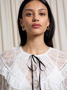 AiiRZ Contrast String Bow Tie Detail Sheer Lace Tiered Crop Cape Top