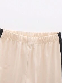 SHEIN Tween Girl Apricot Round Neck Long Sleeve T-Shirt With Black Patchwork Flare Pants 2 Pieces Set