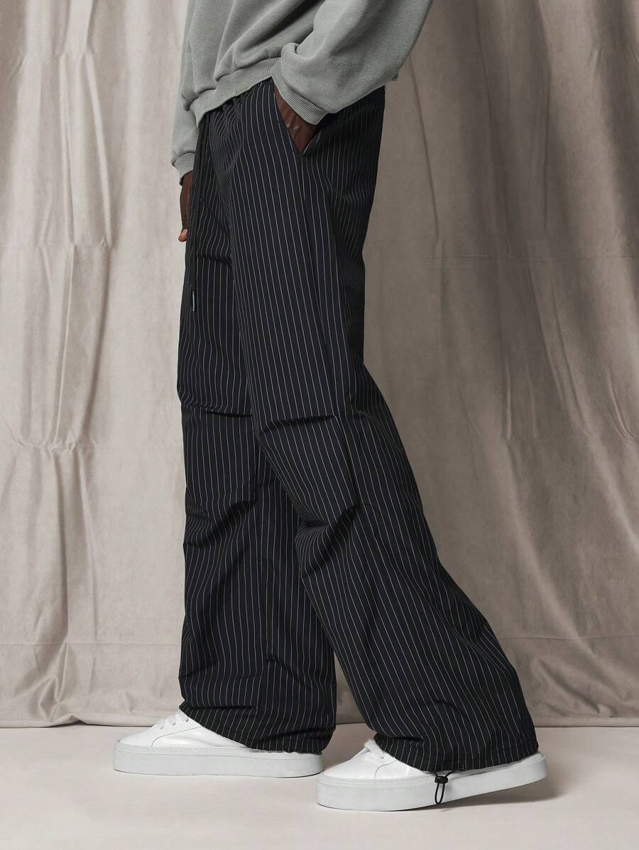SUMWON Loose Flare Fit Pinstripe Pant With Knee Pleats - Black - View 1