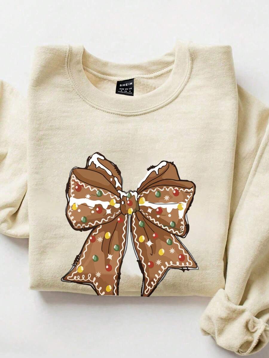 SHEIN EZwear Áo sweatshirt dài tay dáng rộng, họa tiết nơ trang trí Giáng sinh, thích hợp cho nữ, mùa Thu/Đông. - Màu be - Xem 1