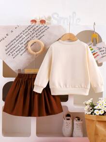 SHEIN Conjunto informal de 2 piezas para niña, sudadera de color liso y falda en línea A, color marrón otoñal