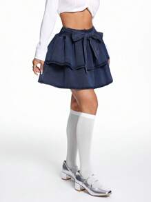 SHEIN EZwear Falda acampanada de mezclilla con lazo frontal y doble capa para mujer