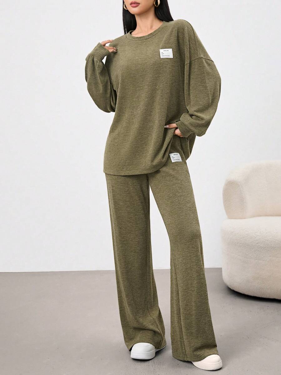 Mulvari Conjunto casual de 2 piezas de sudadera con gráfico de letra y caída de hombro con pantalones para mujer en otoño