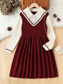 عنابي اللون