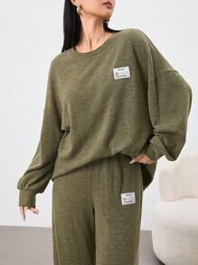 Mulvari Conjunto casual de 2 piezas de sudadera con gráfico de letra y caída de hombro con pantalones para mujer en otoño