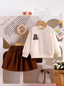 SHEIN Conjunto informal de 2 piezas para niña, sudadera de color liso y falda en línea A, color marrón otoñal