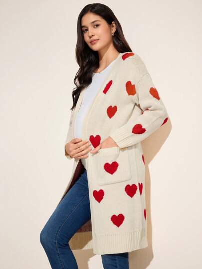 SHEIN Suéter informal y sencillo con bolsillo y estampado de corazón para mujeres embarazadas de manga larga