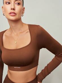 Activina Conjunto de entrenamiento para mujer con top corto sin costuras marrón y pantalones campana para yoga y pilates