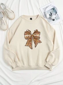 SHEIN EZwear Áo sweatshirt dài tay dáng rộng, họa tiết nơ trang trí Giáng sinh, thích hợp cho nữ, mùa Thu/Đông. - Màu be - Xem 5