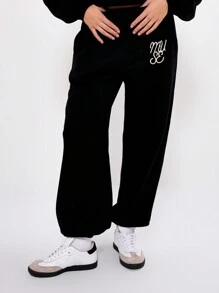 MUSERA Calça de moletom com punho e logo bordado, ideal para férias e viagens no aeroporto. - Preto - Ver 2