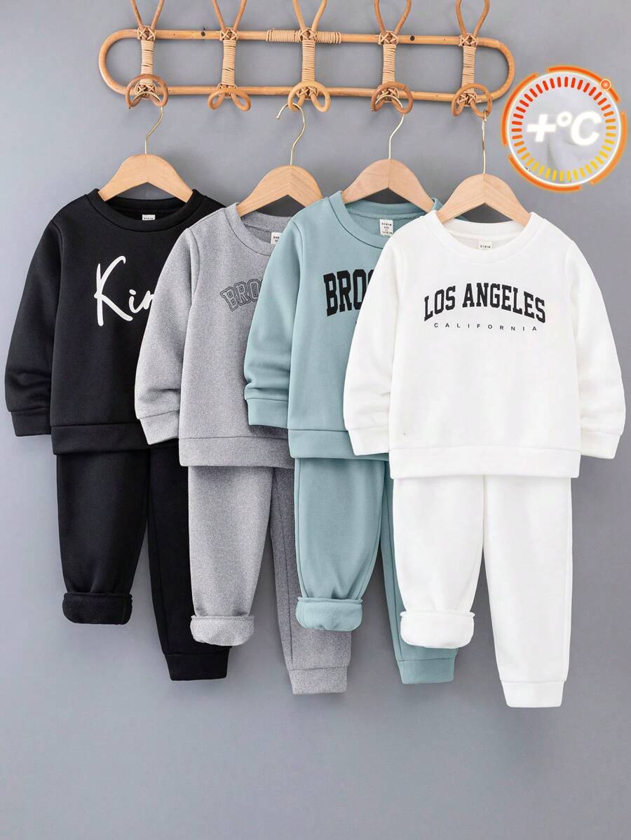 SHEIN Leap Crew Conjunto de 8 piezas de ropa informal para niño, compuesto por sudadera con capucha de manga larga y pantalón con cordón en colores lisos y estampados de letras en negro, blanco y verde caqui, adecuado para ocasiones de otoño/invierno como la escuela, el jardín, la playa, el baby shower, mantiene caliente, adecuado para el uso diario, universitario y deportivo, con un estilo versátil y sencillo, indicado para la vuelta al colegio - Azul - Ver 1