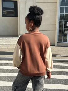 SHEIN Tween-Mädchen Lässiger Pullover mit Rundhalsausschnitt und Farbblockdesign. Lockeres Langarm-Sweatshirt