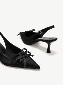 CUCCOO CHICEST 尖头细高跟鞋女款，粉色和黑色拼色，蝴蝶结装饰，后跟高跟，简约时尚，黑色和粉色高跟鞋，情人节款