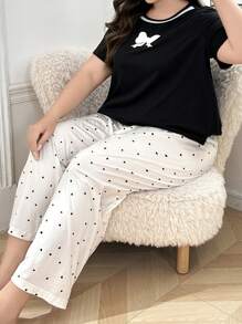 Conjunto de pijama casual con camiseta de manga corta, cuello redondo y estampado de lazos, y pantalones con estampado de lunares