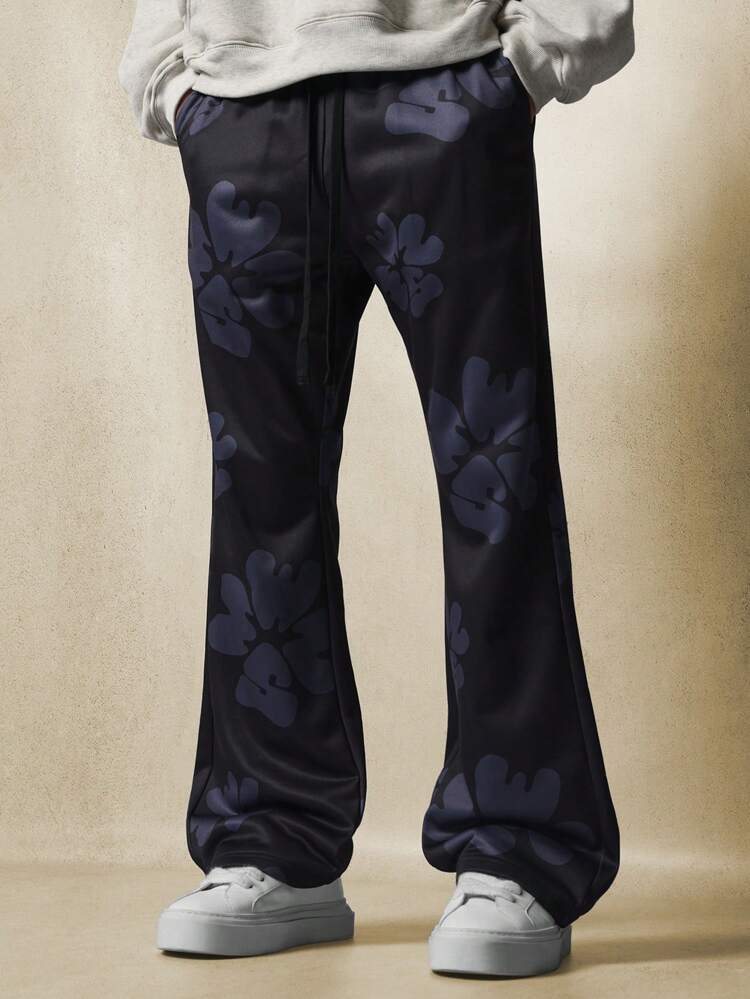 Calça de moletom com estampa floral e cordão na perna larga