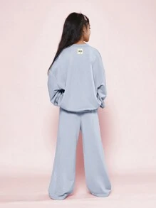 SUMWON Conjunto de 2 piezas para niña preadolescente con sudadera cuello redondo cómoda con estampado gráfico en el cuello y pantalón de chándal de corte recto