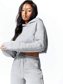 SUMWON WOMEN Crop Graphic Print Hoodie en Flared Jogger met Split Zoom Set