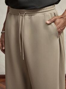 AKNOTIC Business Casual Men's Khaki Knit Loose Straight-Leg Casual Pants, Drawstring Elastic Waist, Suitable For Daily Wear In Autumn/Winter, With Letter Branding & Metal Decor - Khaki - View 4