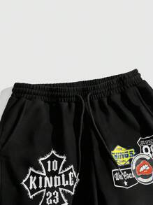 ROMWE MEN Street Life Pantalón de chándal acampanado con estampado de carreras y llamas para hombre - Negro - Ver 4