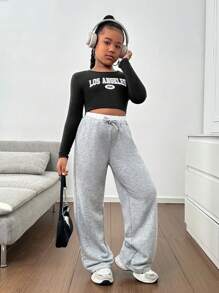 SHEIN Set de 2 piezas de pantalones anchos de punto de cintura elástica con parches, de unicolor y otro de estampado camuflaje, para niñas preadolescentes - Multicolor - Ver 5