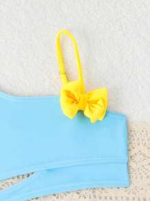 Conjunto de bikini lindo con estampado de patitos y lazo decorativo para niñas pequeñas, ideal para playa y vacaciones