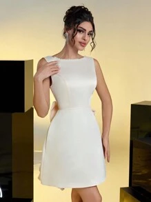 Lovelzi Elegant And Romantic Champagne-Colored Satin Gorgeous Faux Pearl Webbing Exaggerated Bow U-Shaped Back Evening Bachelorette Party, Prom Date, Birthday Cocktail Dress, Wedding Guest Dress