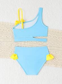 Conjunto de bikini lindo con estampado de patitos y lazo decorativo para niñas pequeñas, ideal para playa y vacaciones