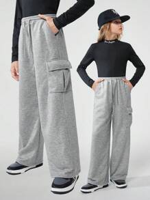 SHEIN Tween Girls Casual Street Style Solid Color Drawstring Waist Flap Pocket Loose Cargo Sweatpants