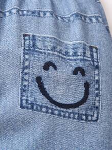 SHEIN 年轻男孩休闲抽绳腰带字母和笑脸印花慢跑裤，时尚春秋街头服饰