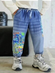 SHEIN 年轻男孩休闲抽绳腰带字母和笑脸印花慢跑裤，时尚春秋街头服饰