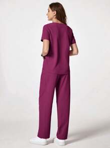 TaskEZ Conjunto de uniforme de enfermería con blusa de cuello en V de manga corta y pantalones en bloques de color para mujer