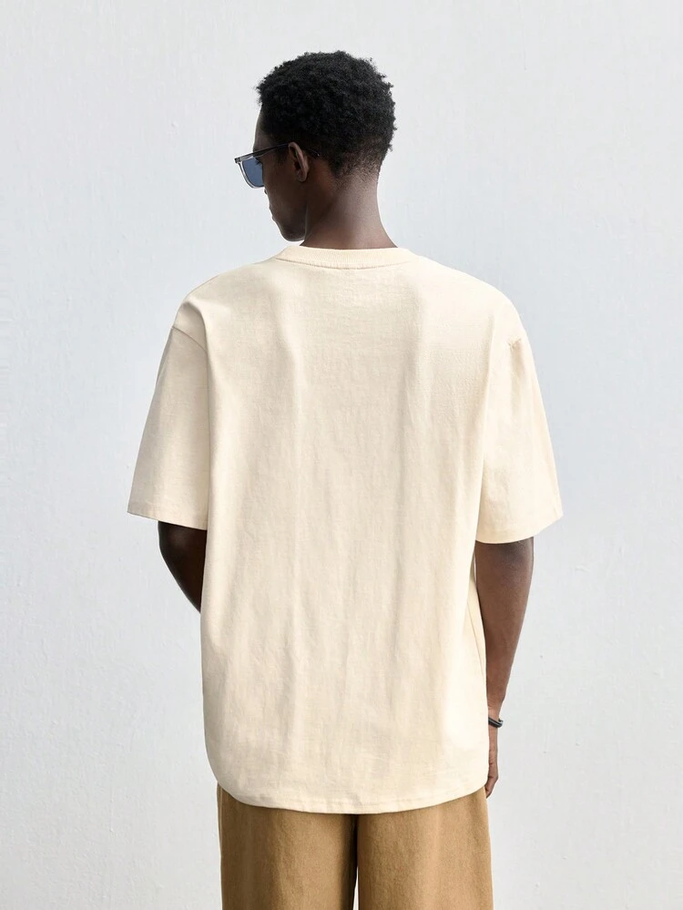 SHEIN Maija Men's 2025 New Arrival Winter Beige Solid Color Loose Fit Round Neck Short Sleeve T-Shirt With English Embroidery, Minimalist Design Suitable For Christmas, Casual, Party, Holiday Gathering, Commuting, New Year, Valentine's Day, Dates